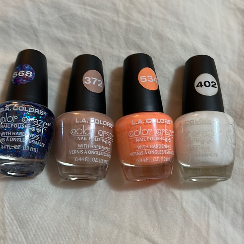 4 L.A. Colors Nail Polish and Clinique bag